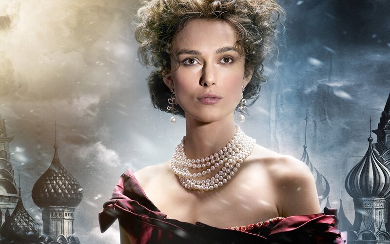 Woman in pearls with Russian architecture