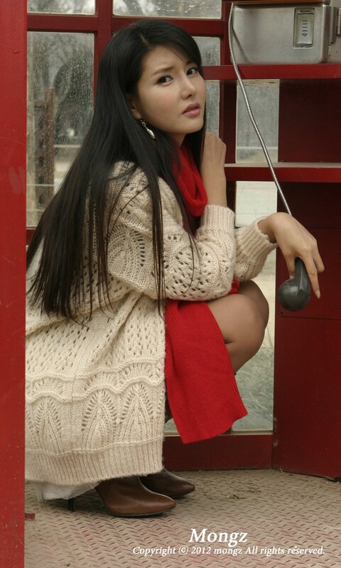 woman in phone booth