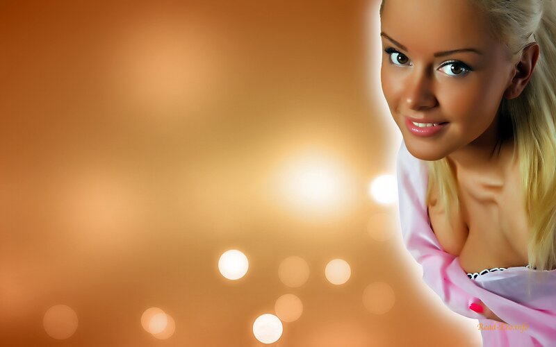 woman in pink against warm background