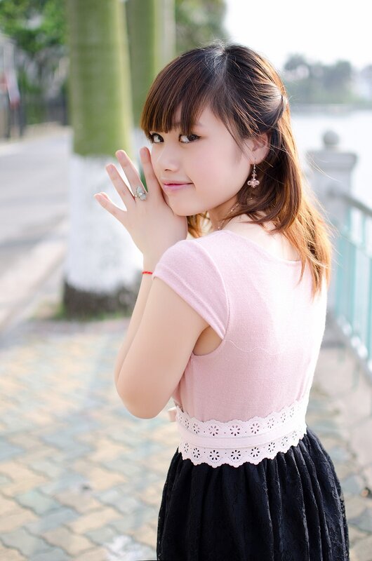 woman in pink and black dress