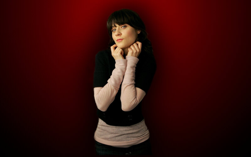 woman in pink and black sweater