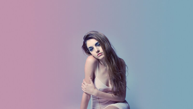 woman in pink and blue lighting