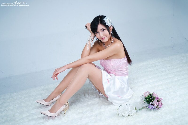 woman in pink and white dress