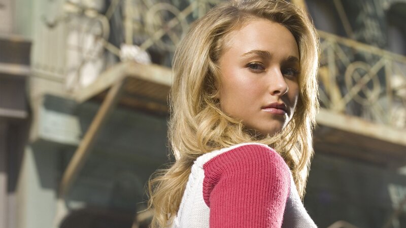 woman in pink and white sweater