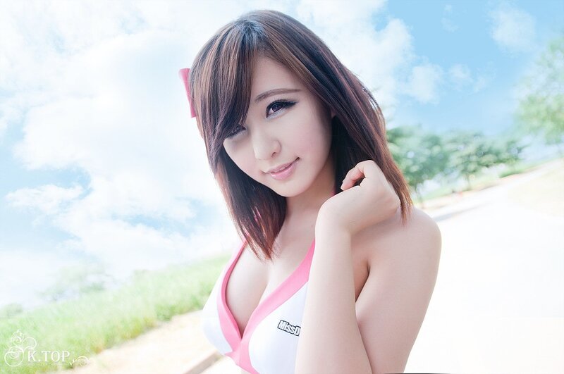 woman in pink and white top