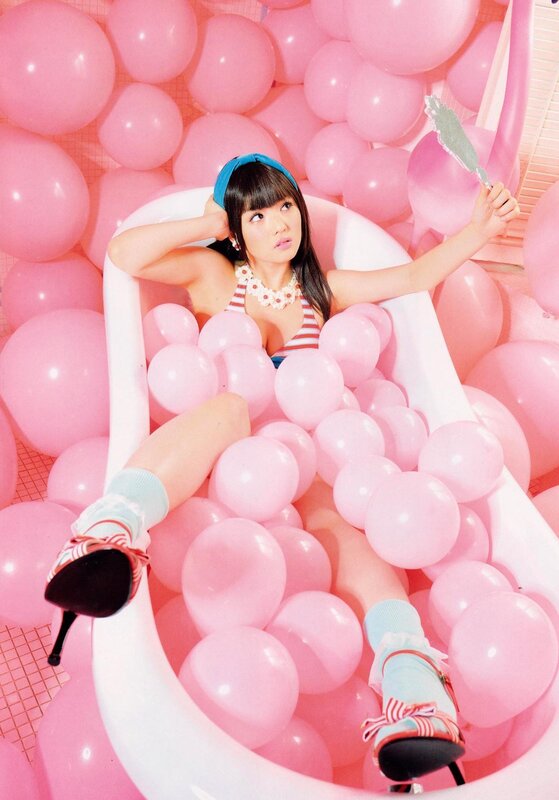 woman in pink balloon bath