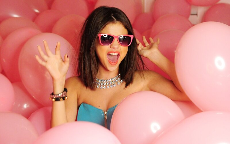 woman in pink balloons