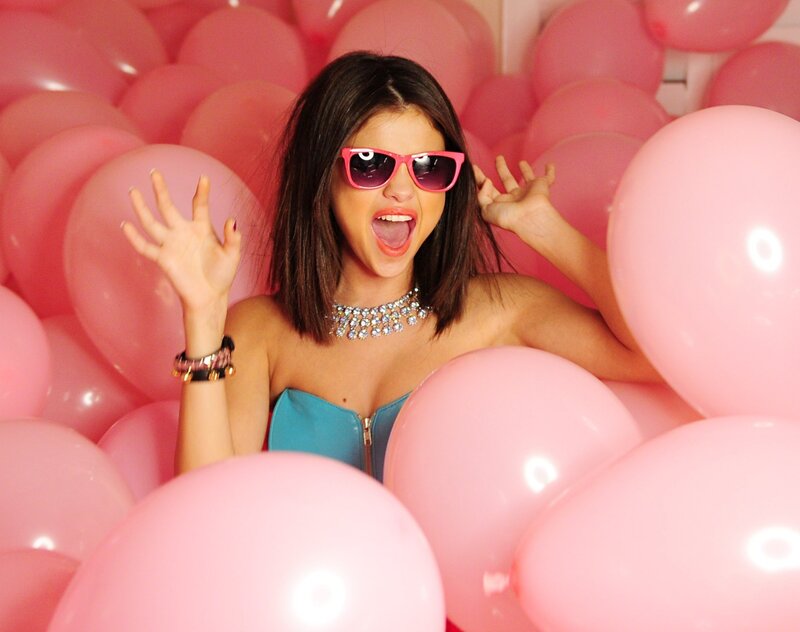 woman in pink balloons
