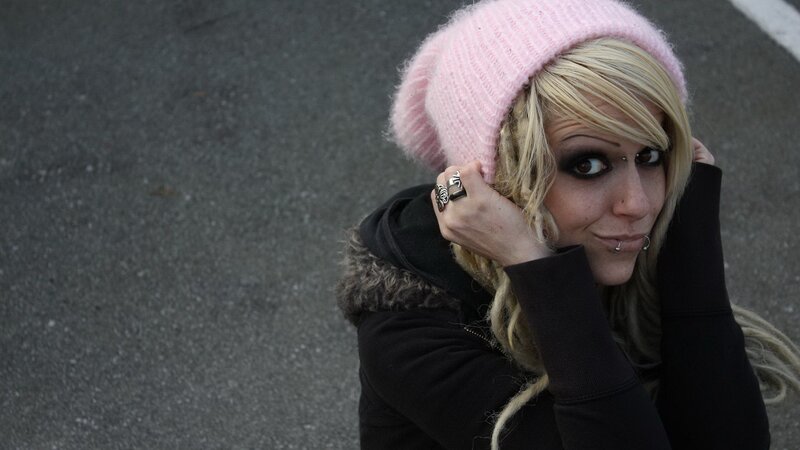 woman in pink beanie