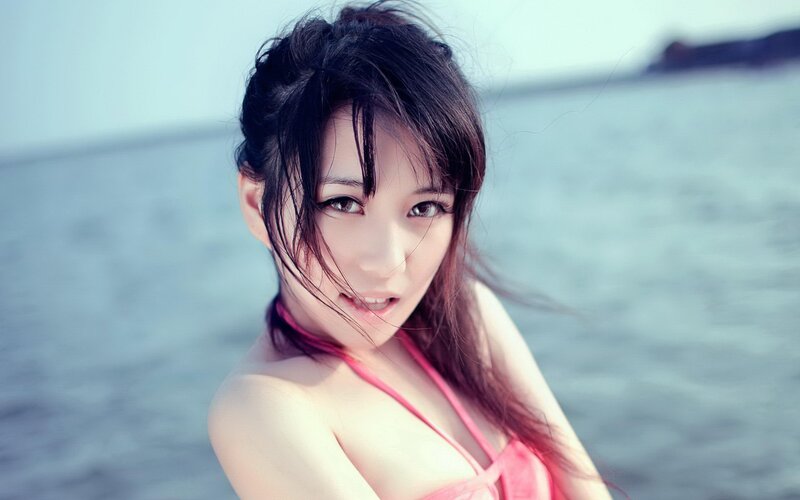 woman in pink bikini at beach