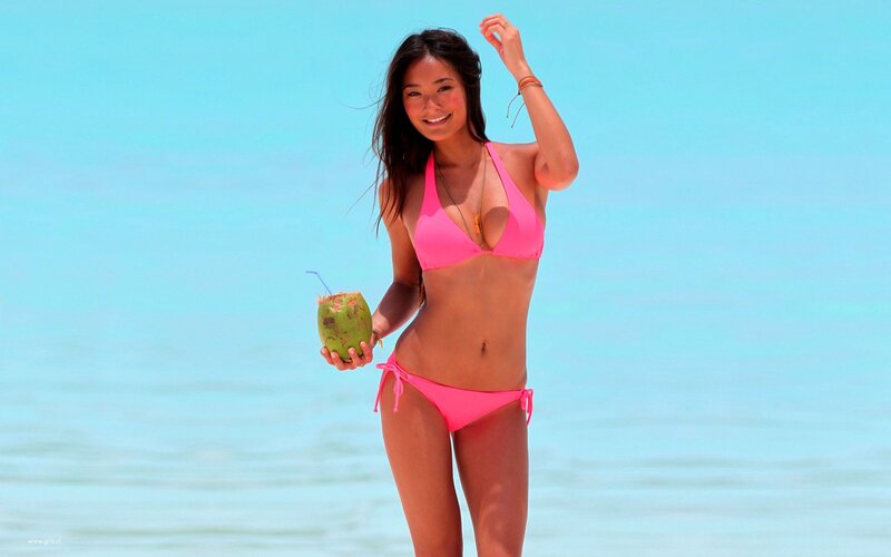 Woman in pink bikini at beach