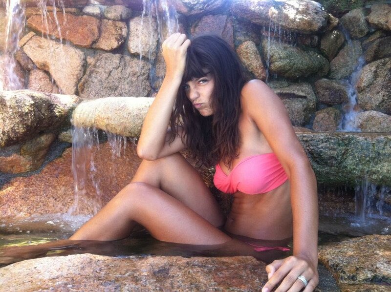 woman in pink bikini at waterfall
