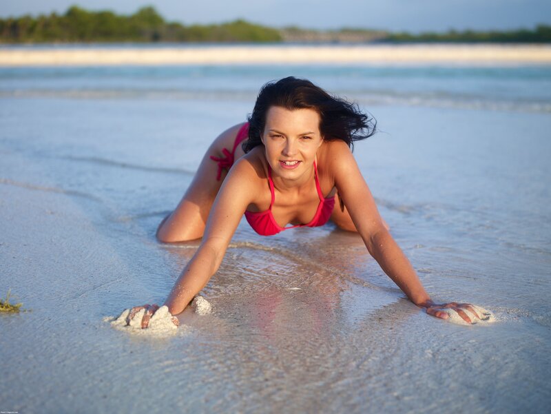 woman in pink bikini on beach