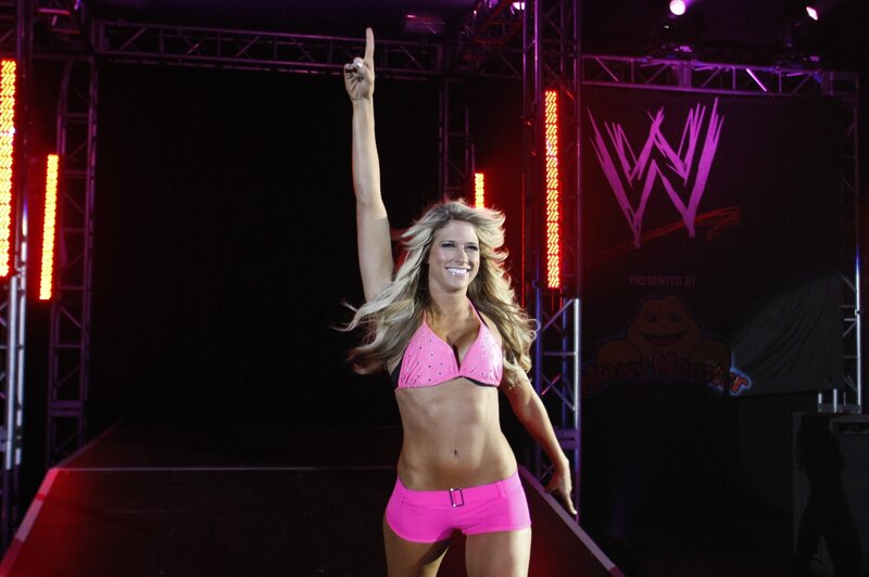 Woman in pink bikini on stage
