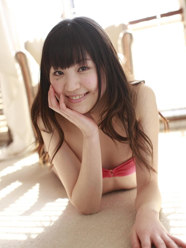woman in pink bikini smiling