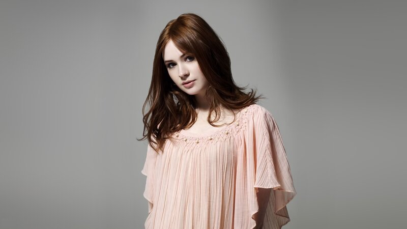 woman in pink blouse