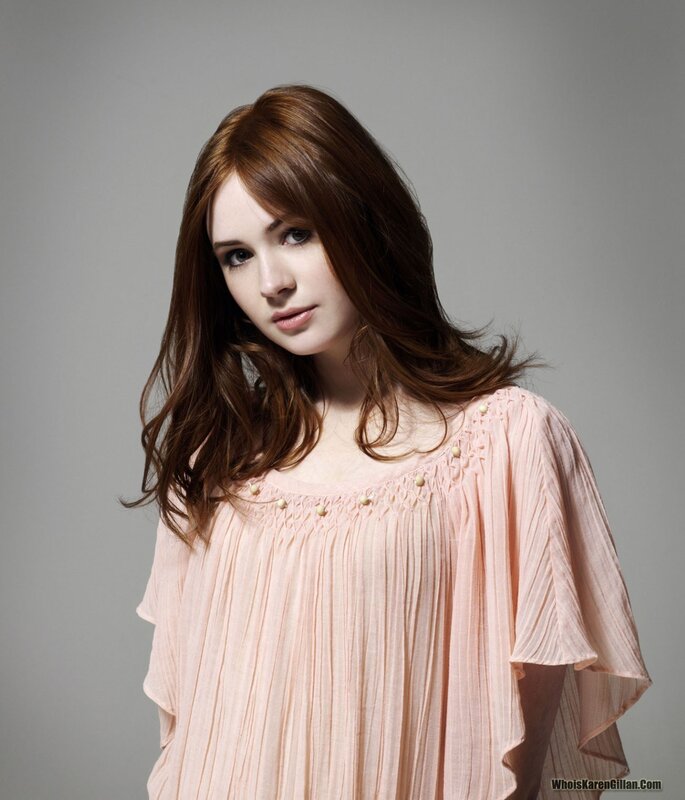 woman in pink blouse