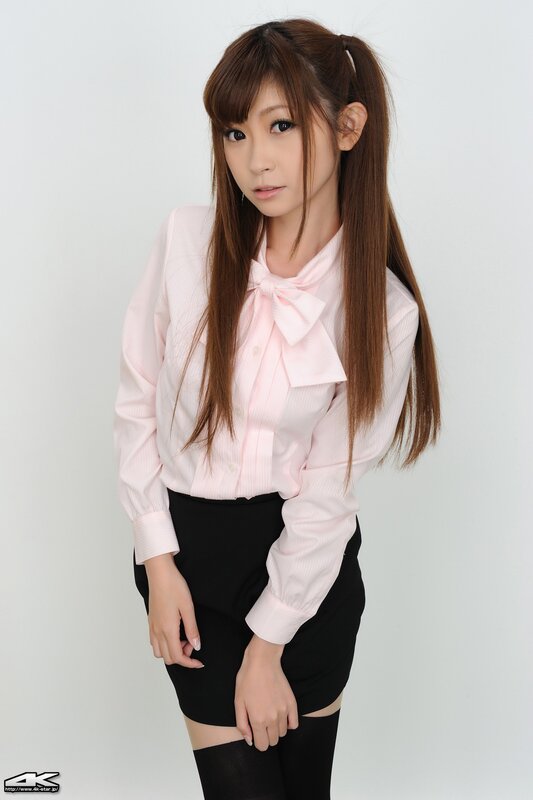 woman in pink blouse and black skirt