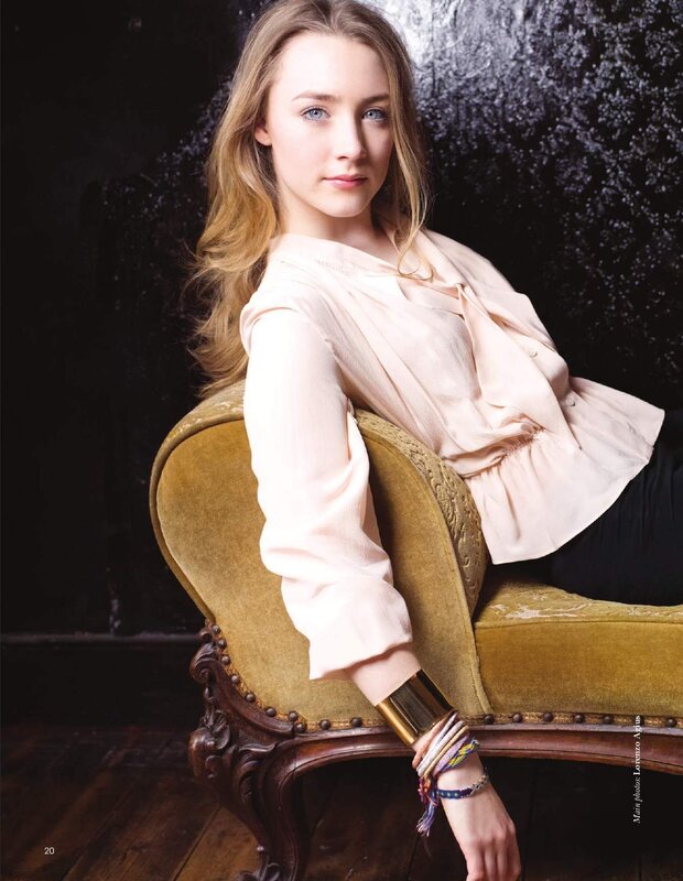 woman in pink blouse on couch