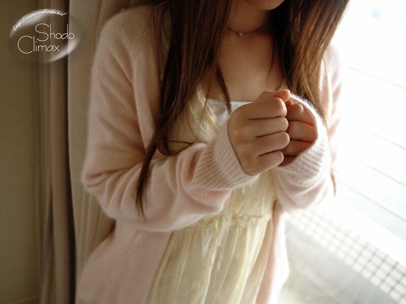 woman in pink cardigan