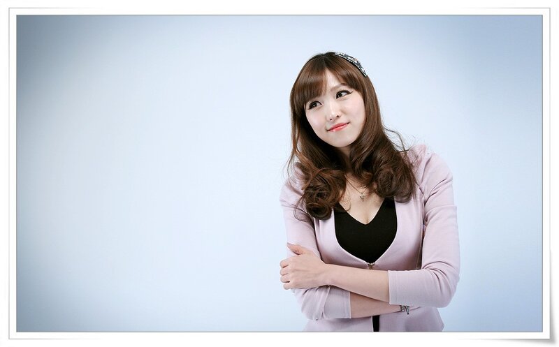 woman in pink cardigan