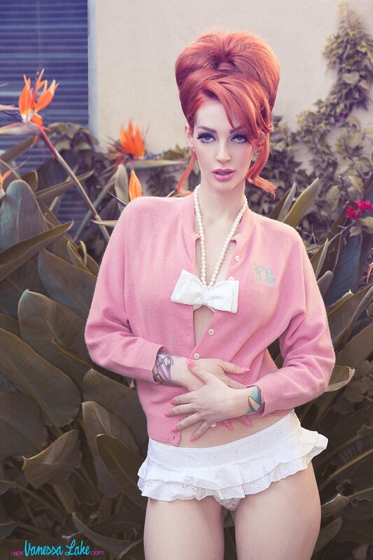 Woman in pink cardigan