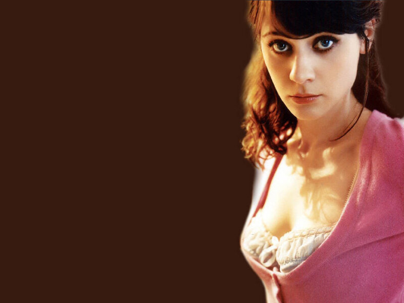 woman in pink cardigan