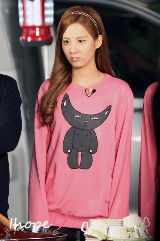 woman in pink cat sweatshirt