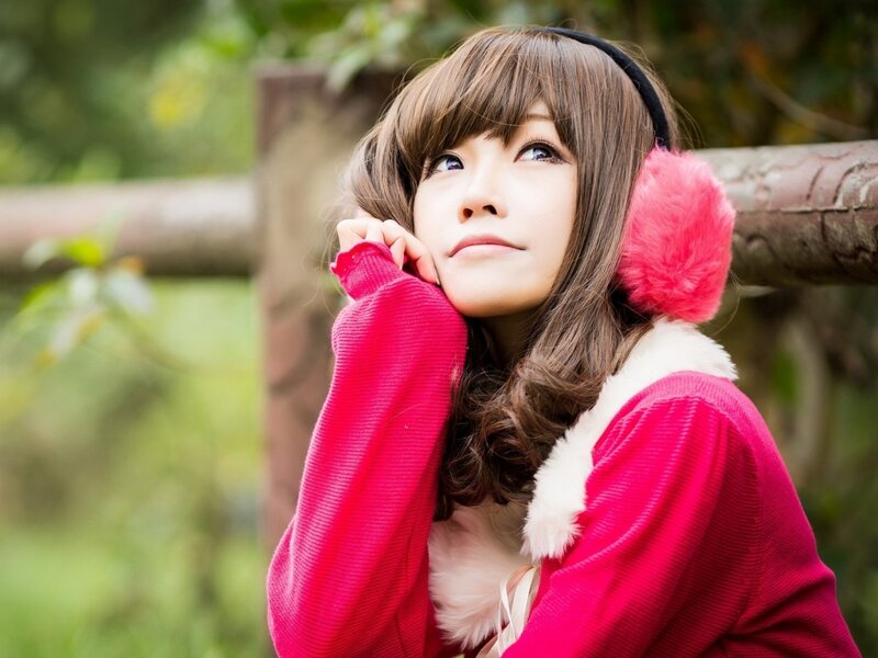 Woman in Pink Coat — Contemplative