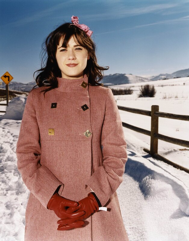 Woman in pink coat in snow