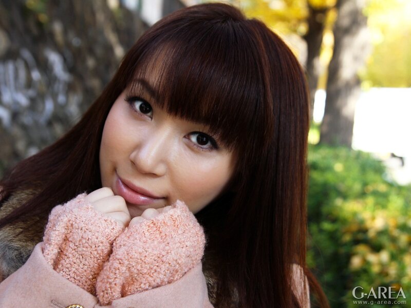 woman in pink coat outdoors