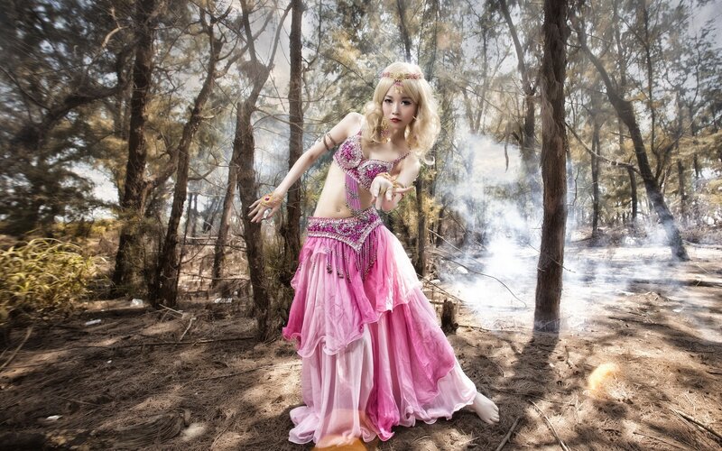 Woman in Pink Costume — Dramatic, Afternoon