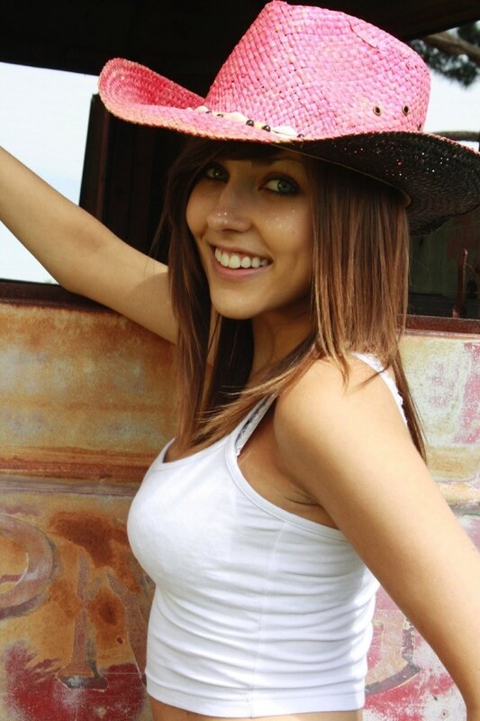 woman in pink cowboy hat