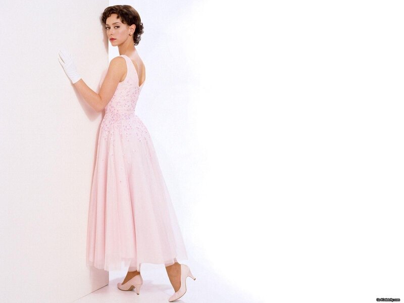 woman in pink dress and gloves