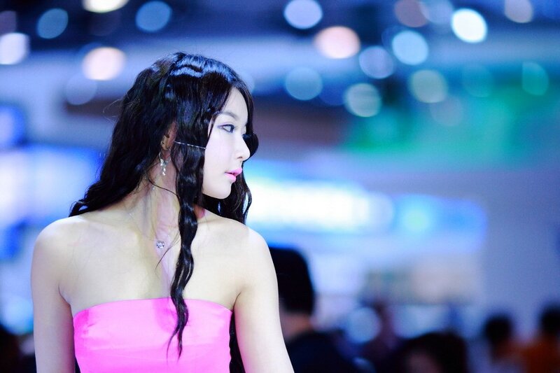 woman in pink dress at event