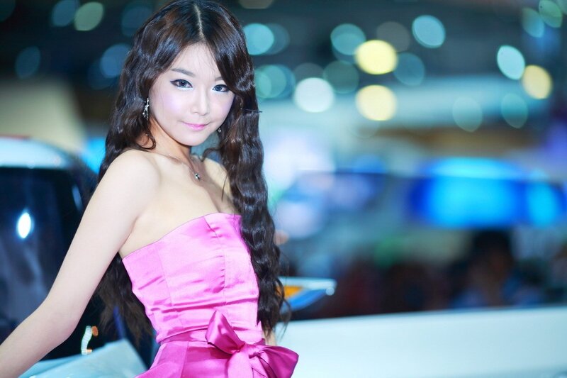 Woman in pink dress at event