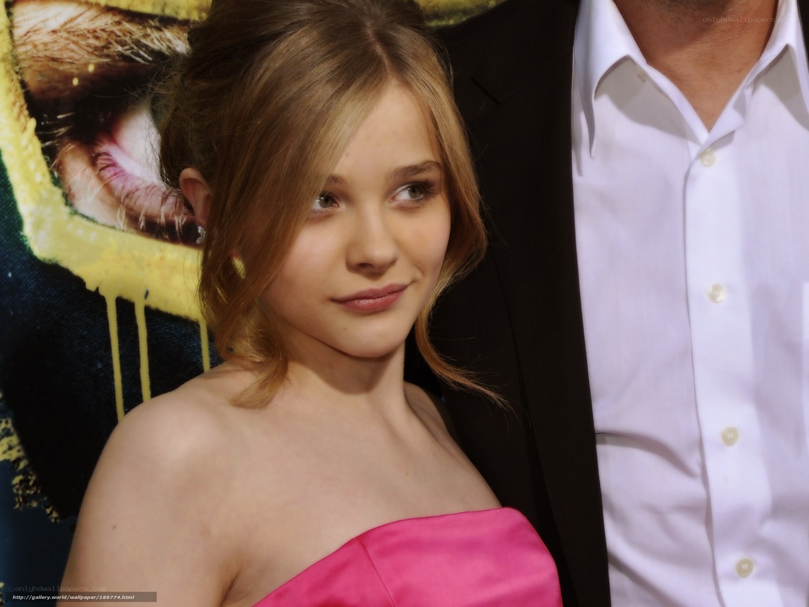 woman in pink dress at event