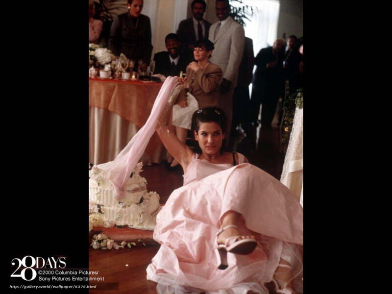 Woman in pink dress at wedding