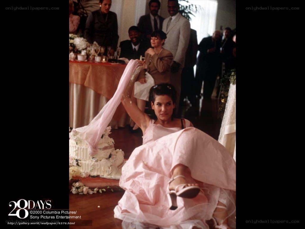 Woman in pink dress at wedding