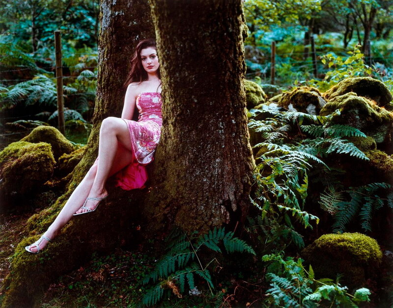 woman in pink dress by tree
