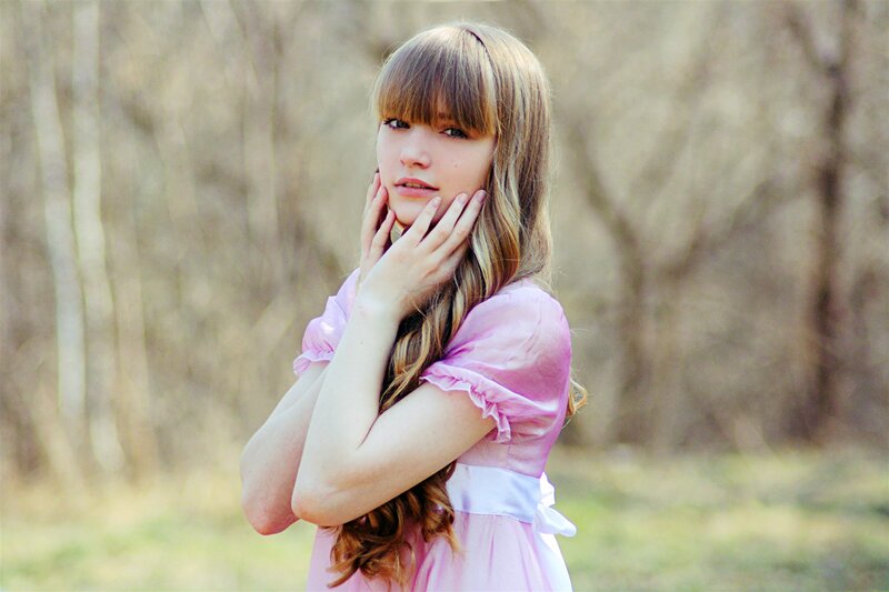 Woman in Pink Dress — Contemplative, Spring