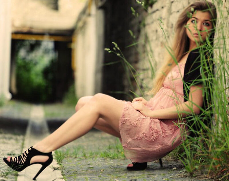 Woman in Pink Dress — Contemplative