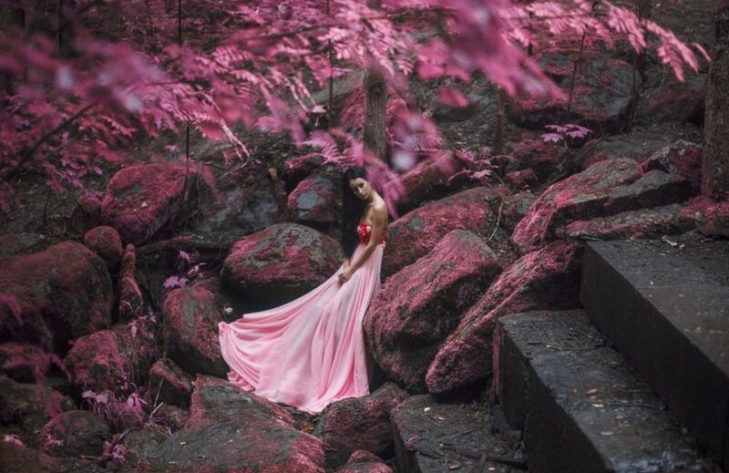 Woman in Pink Dress — Dramatic, Photograph, Rocks