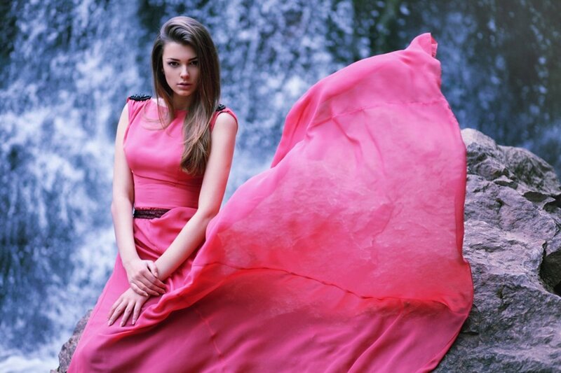 Woman in Pink Dress — Dramatic, Photograph, Waterfall, Rocks