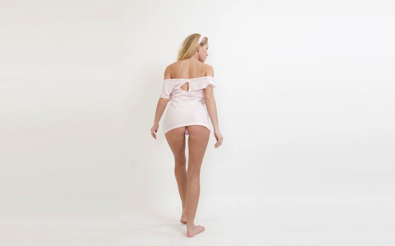 woman in pink dress from behind