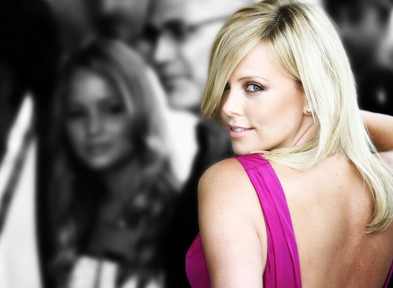 woman in pink dress looking back