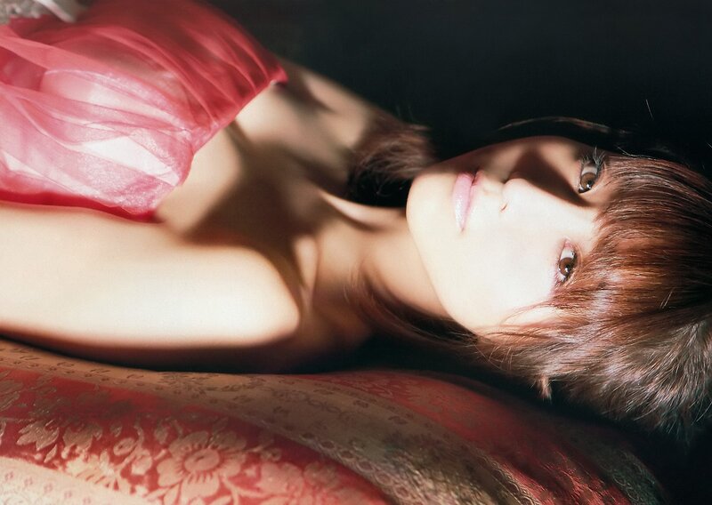 woman in pink dress lying down