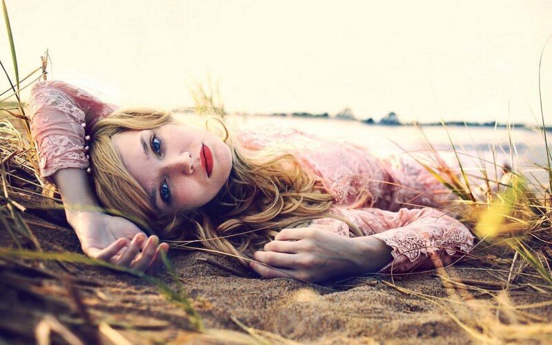 woman in pink dress on beach