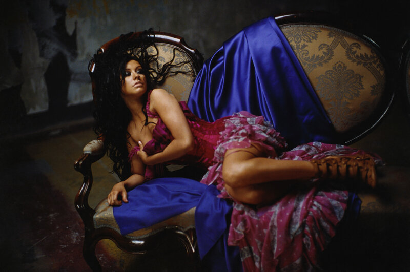 woman in pink dress on chair