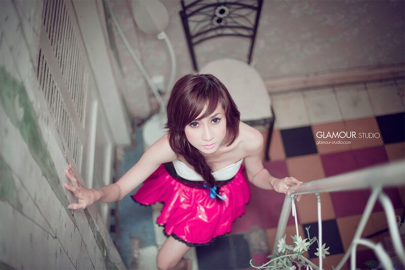 Woman in pink dress on stairs